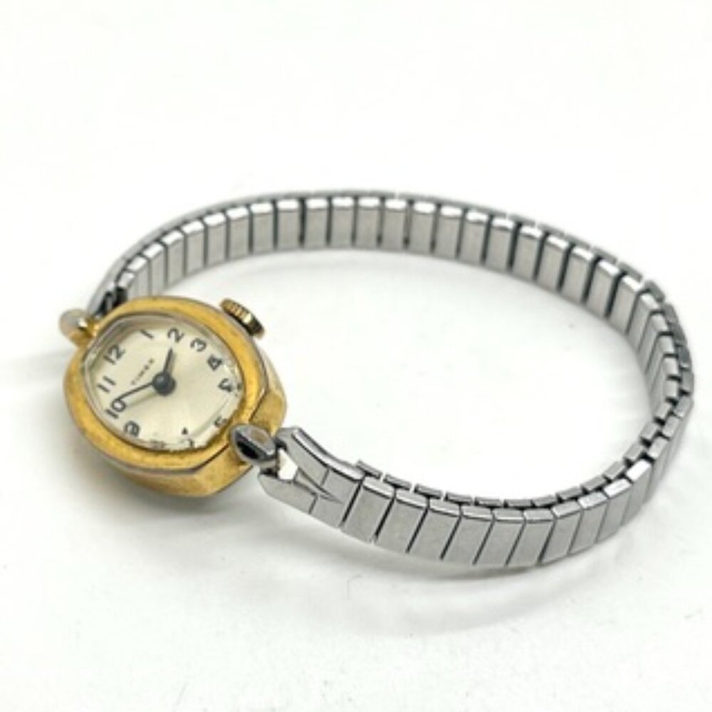 VINTAGE TIMEX CAVATINA Ladies Gold Tone Oval Watch Stretch Dainty AS IS READ